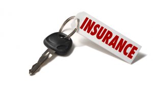 A car key with a Red and white insurance tag. A hit and run is a prime example of why it is important to carry Uninsured Motorist coverage. 