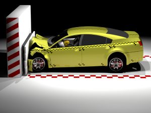 A front impact car crash test where yellow car crashes into a standing wall. Recent safety tests show that not all vehicles react the same in a crash.