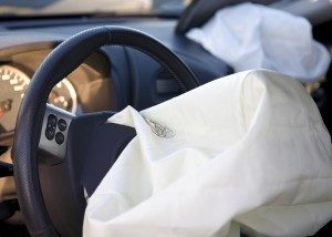 A deployed steering wheel airbag. Takata increase airbag recalls.
