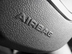A car airbag. Takata, an airbag distributor, to pay millions in penalties for defective airbags.