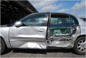 An automobile that was in a car accident where the driver and back drivers side passenger doors are severly damanged. To protect yourself, you should purchase from Uninsured / Underinsured Motorists coverage.