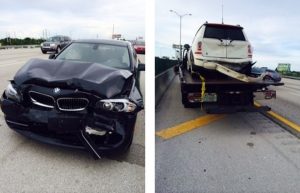 A black car and a white SUV crushed in a rear-end car accident.