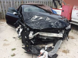 Car wreck with front-end damage