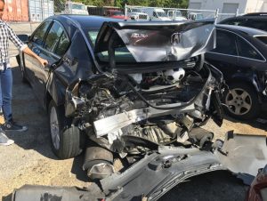 Pile of debrie of rear-end car crash