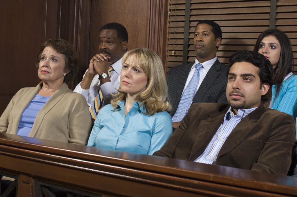 Jurors in a jury box in a trial