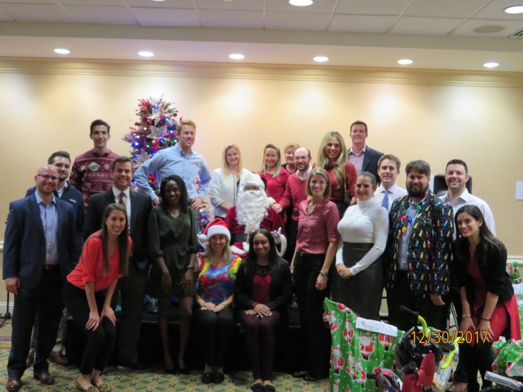 Group shot of member of YLS at Annual Kid Holiday Party