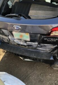 Vehicle showing read-end damage due to accident