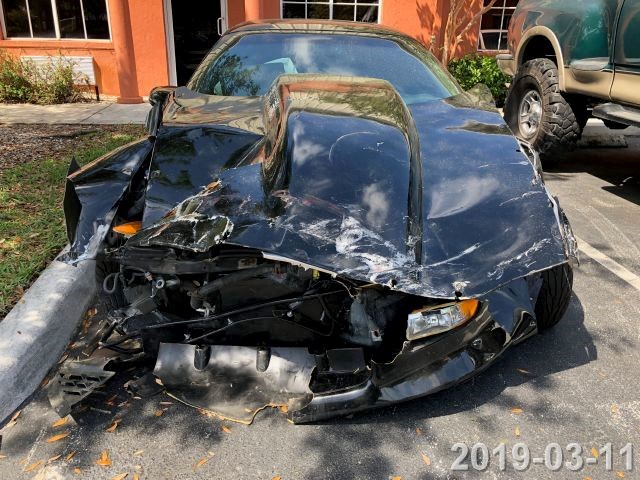 Car showing front end-damage as a result of an auto accident