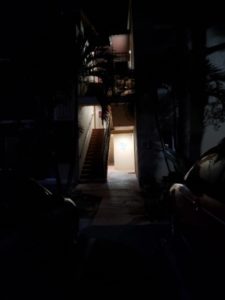 Dark and dangerous pathway at an apartment complex