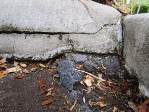 Closeup view of hidden dangerous heap of asphalt